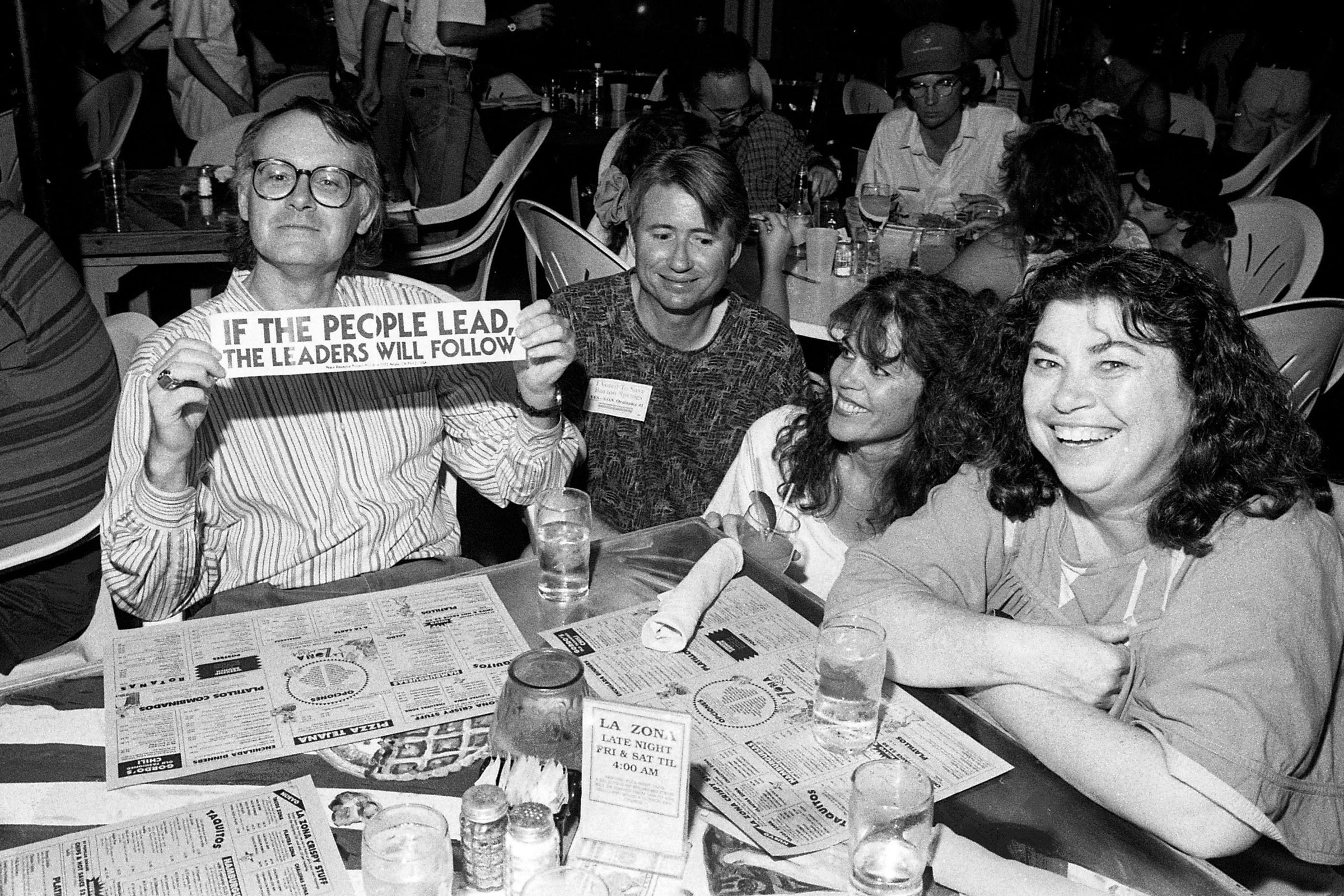 Barton Springs advocates celebrate the S.O.S. victory at La Zona Rosa, one of the many local businesses supportive of the Save Our Springs movement. (Courtesy Alan Pogue)