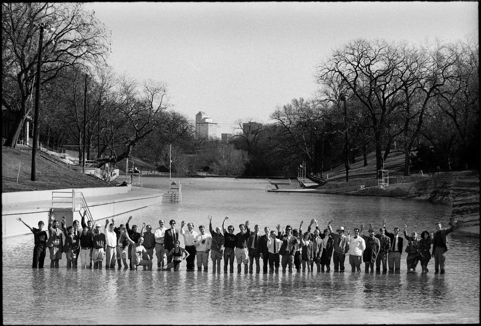 Photo of mambers of the Austin Business Community standing in Barton Springs pool in 1992