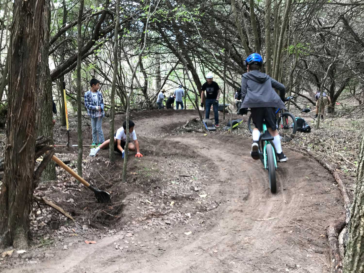 A young rider tests out a new trail.